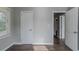 Bedroom with wood-look floors, window, and closet at 1255 Glen Forest Way, Decatur, GA 30032