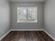Bright bedroom with new flooring and large window at 1255 Glen Forest Way, Decatur, GA 30032