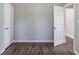 Bright bedroom with wood-look floors and ample closet space at 1255 Glen Forest Way, Decatur, GA 30032