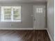 Bright entryway with new flooring and updated door at 1255 Glen Forest Way, Decatur, GA 30032