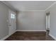 Spacious living room featuring hardwood floors and built-in shelving at 1255 Glen Forest Way, Decatur, GA 30032