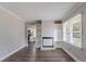 Living room with fireplace and built-in shelving at 1255 Glen Forest Way, Decatur, GA 30032