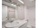 Clean bathroom with white tile and a marble vanity top at 175 Rue Fontaine, Lithonia, GA 30038