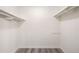 Large walk-in closet with double hanging rods and shelving at 175 Rue Fontaine, Lithonia, GA 30038