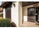 Inviting building entryway with a brown door and landscaping at 175 Rue Fontaine, Lithonia, GA 30038