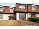 Front view of a building with brown roof and white walls at 175 Rue Fontaine, Lithonia, GA 30038