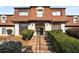 Attractive exterior of a two-story building with brick and shingle accents at 175 Rue Fontaine, Lithonia, GA 30038