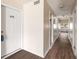 Clean hallway with light walls and wood-look flooring at 175 Rue Fontaine, Lithonia, GA 30038