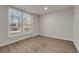 Bright and airy basement bedroom with large window and LVP flooring at 3845 Montvale Xing, Cumming, GA 30041