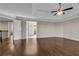 Main bedroom with hardwood floors and access to ensuite bathroom at 3845 Montvale Xing, Cumming, GA 30041