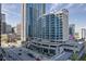 High-rise building with city views and surrounding buildings at 400 W Peachtree Nw St # 2313, Atlanta, GA 30308