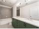 Double vanity bathroom with granite countertop at 400 W Peachtree Nw St # 2313, Atlanta, GA 30308