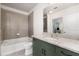 Modern bathroom with green vanity and granite countertop at 400 W Peachtree Nw St # 2313, Atlanta, GA 30308