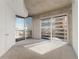 Bedroom with floor to ceiling windows and city view at 400 W Peachtree Nw St # 2313, Atlanta, GA 30308