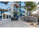 Outdoor grilling area with tables and chairs at 400 W Peachtree Nw St # 2313, Atlanta, GA 30308