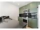 Modern kitchen with granite countertops and stainless steel appliances at 400 W Peachtree Nw St # 2313, Atlanta, GA 30308