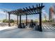 Rooftop patio with pergola and seating at 400 W Peachtree Nw St # 2313, Atlanta, GA 30308