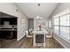 Bright dining area with a modern table and large windows at 5277 Brentwood Rd, Atlanta, GA 30349