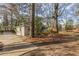 Home with large backyard and mature trees at 667 Steve Sw Dr, Atlanta, GA 30315