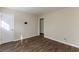 Simple bedroom with carpet and neutral colored walls at 667 Steve Sw Dr, Atlanta, GA 30315