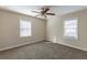 Bright bedroom with neutral walls and ceiling fan at 667 Steve Sw Dr, Atlanta, GA 30315