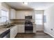 Renovated kitchen with stainless steel appliances and granite countertops at 667 Steve Sw Dr, Atlanta, GA 30315
