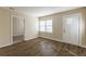 Spacious living room with hardwood floors and lots of natural light at 667 Steve Sw Dr, Atlanta, GA 30315