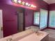 Double sink vanity and a bathtub in the main bathroom at 1886 Clay Sw Dr, Marietta, GA 30064