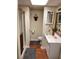 Clean basement bathroom with shower, toilet and vanity at 1886 Clay Sw Dr, Marietta, GA 30064