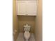 Small half bathroom featuring white toilet and cabinet at 1886 Clay Sw Dr, Marietta, GA 30064