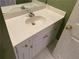 Bathroom vanity with faucet and white cabinets at 1886 Clay Sw Dr, Marietta, GA 30064