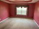 Carpeted bedroom with one window and interesting ceiling design at 1886 Clay Sw Dr, Marietta, GA 30064