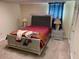 Basement bedroom with a queen-size bed and nightstands at 1886 Clay Sw Dr, Marietta, GA 30064