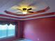 This bedroom features an attractive trey ceiling and a ceiling fan at 1886 Clay Sw Dr, Marietta, GA 30064