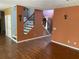 Inviting foyer showcasing hardwood floors, staircase, and neutrally painted walls at 1886 Clay Sw Dr, Marietta, GA 30064