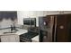 Modern kitchen with stainless steel appliances and white cabinetry at 1886 Clay Sw Dr, Marietta, GA 30064