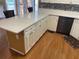 Updated kitchen with large island, white cabinets, and quartz countertops at 1886 Clay Sw Dr, Marietta, GA 30064