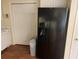 Bright kitchen with white cabinets, stainless steel appliances and wood-look floors at 1886 Clay Sw Dr, Marietta, GA 30064
