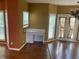 Functional office nook featuring built-in desk, natural light, and wood flooring in a multi-purpose space at 1886 Clay Sw Dr, Marietta, GA 30064