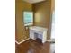 Built-in office nook with white desk, wood floors, and natural light offering a functional workspace at 1886 Clay Sw Dr, Marietta, GA 30064