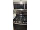 Stainless steel gas range with microwave above at 1886 Clay Sw Dr, Marietta, GA 30064