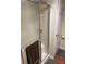Bathroom with a sliding glass shower door and a dark colored bath towel at 1886 Clay Sw Dr, Marietta, GA 30064