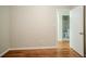 Bedroom with hardwood floors and bathroom access at 1967 Glen Echo Dr, Decatur, GA 30032