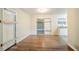 Hardwood floors in dining room, some damage is visible at 1967 Glen Echo Dr, Decatur, GA 30032