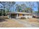 Front view of brick ranch house needing some repairs at 1967 Glen Echo Dr, Decatur, GA 30032