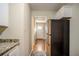 View from kitchen to hallway with hardwood floors at 1967 Glen Echo Dr, Decatur, GA 30032