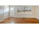 Hardwood floors and neutral walls in the living room at 1967 Glen Echo Dr, Decatur, GA 30032