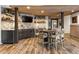 Basement bar with seating and wine storage at 571 Glen Eagles Se Cir, Marietta, GA 30067