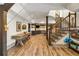 Finished basement with bar, game table, and stairs at 571 Glen Eagles Se Cir, Marietta, GA 30067