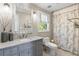 Bathroom with granite vanity and patterned shower curtain at 571 Glen Eagles Se Cir, Marietta, GA 30067